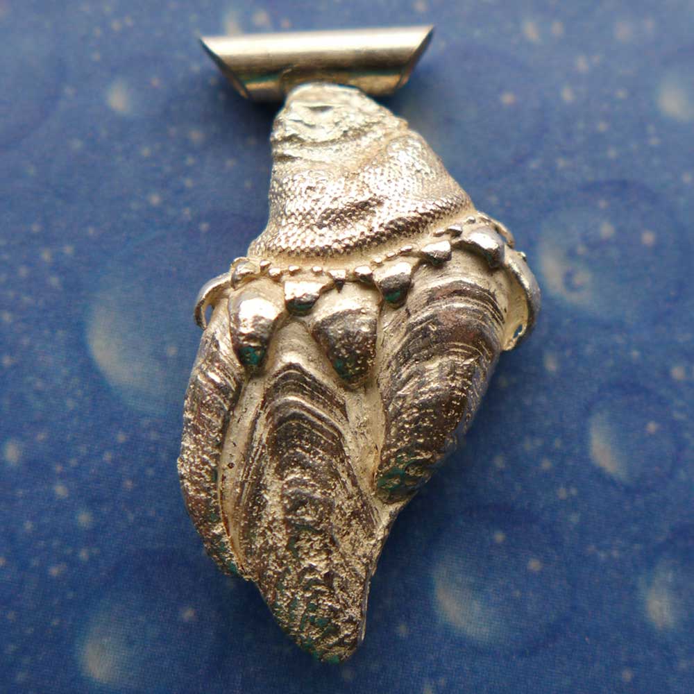 Essbares Ding m Anhänger Enten Muschel