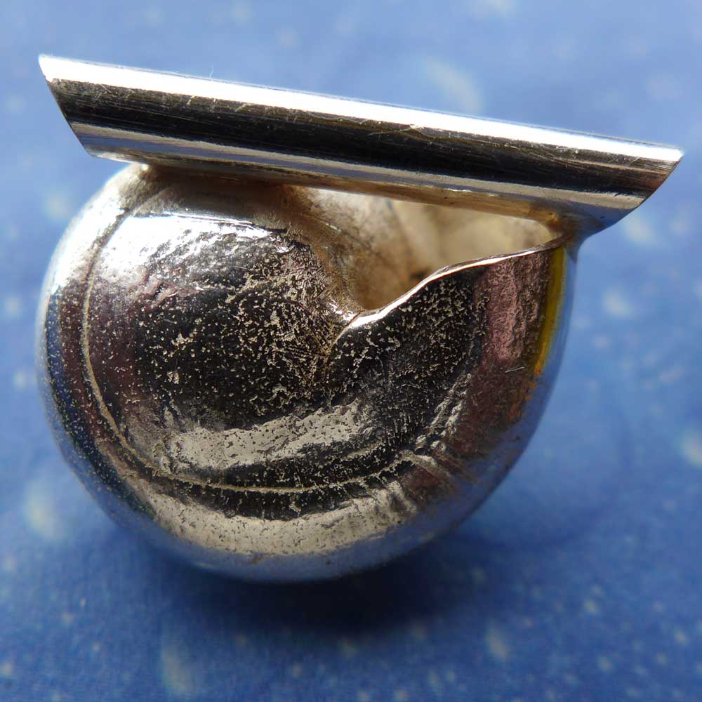 Maritimschmuck Anhänger Knopfschnecke Rückseite