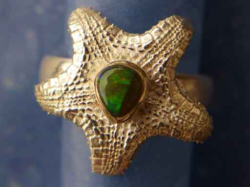 Kissenstern mit Opal Ring